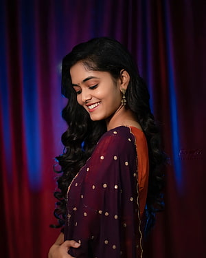 Ananya Sharma in a purple and orange ethnic outfit with long wavy hair HD phone wallpaper