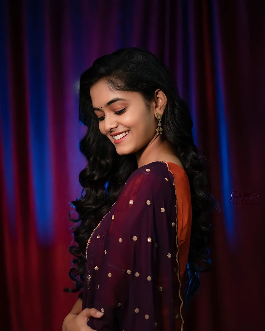 Ananya Sharma in a purple and orange ethnic outfit with long wavy hair HD phone wallpaper