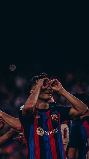 Robert Lewandowski celebrating a goal in FC Barcelona jersey with hands over eyes HD phone wallpaper