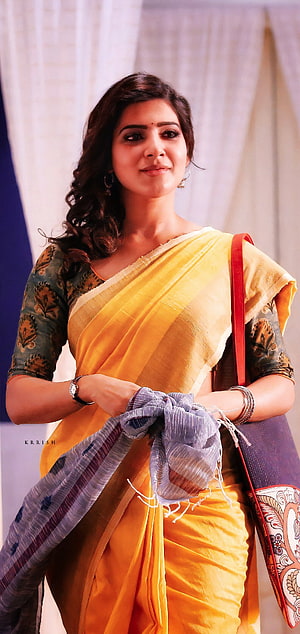Samantha Akkineni in a vibrant yellow silk saree with floral blouse and traditional jewelry HD phone wallpaper