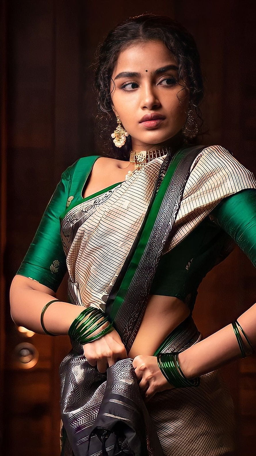 Anupama Parmeshwaran in a Green and Silver Silk Saree with Traditional Gold Jewelry HD phone wallpaper