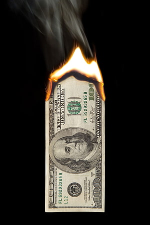 Burning One Hundred Dollar Bill with Flames and Smoke on Black Background HD phone wallpaper