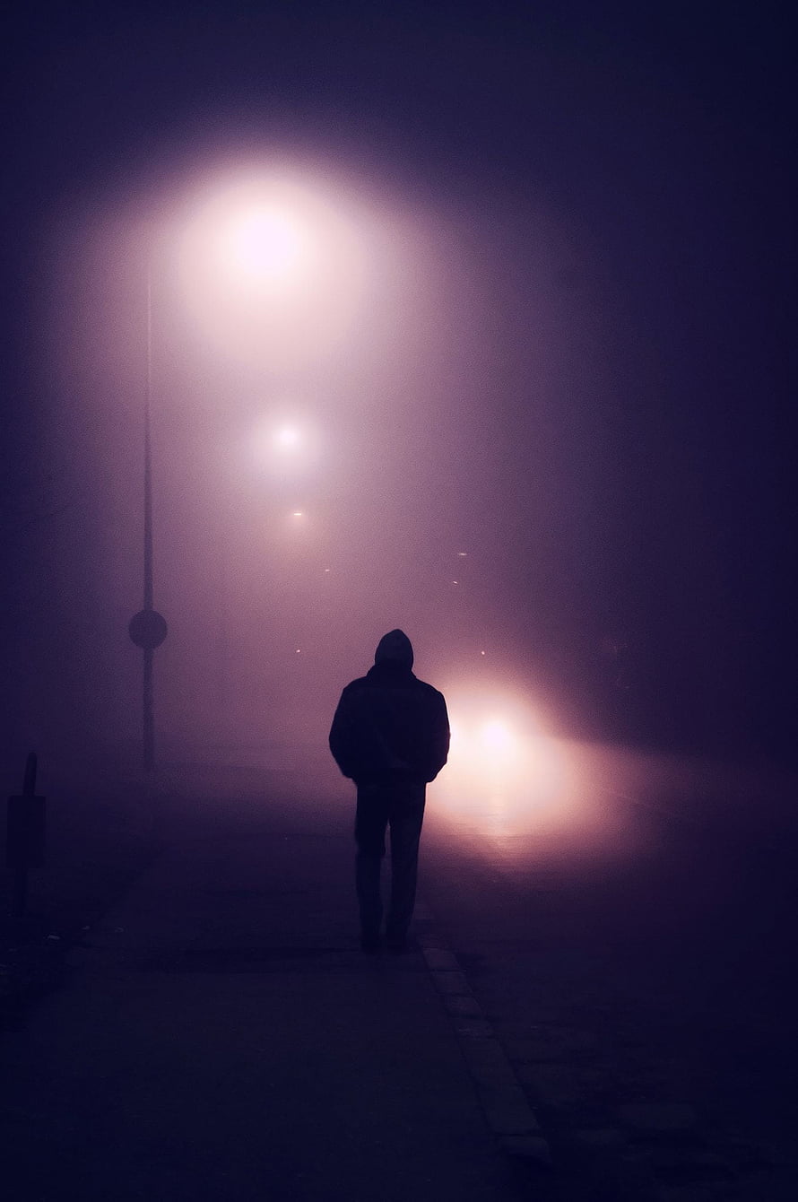 Lone Silhouette Walking Through Thick Purple Fog Under Streetlights at Night HD phone wallpaper