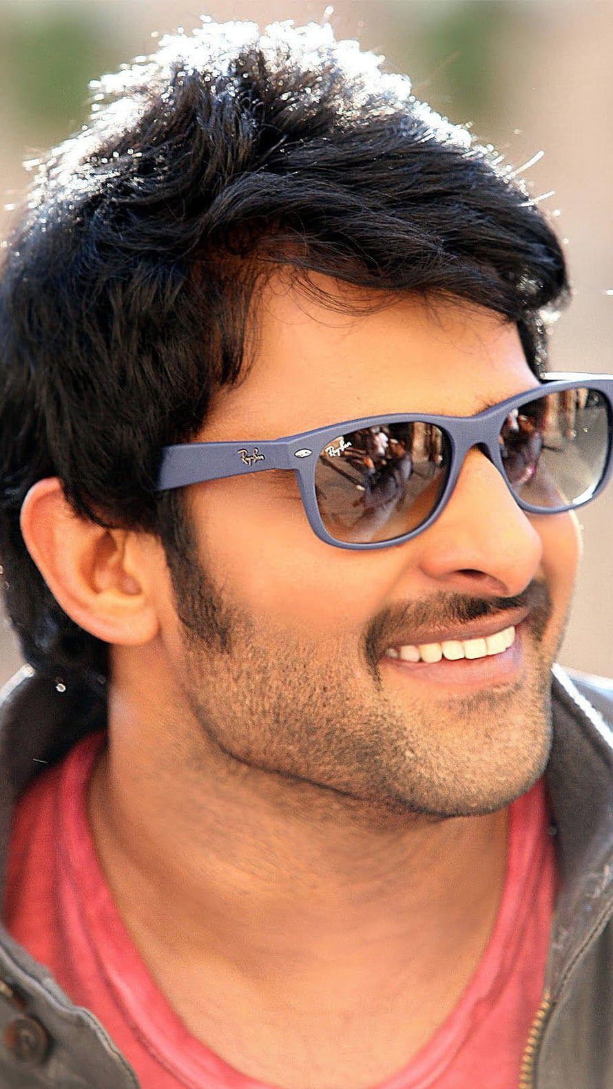 Prabhas Wearing Ray-Ban Sunglasses and a Red T-Shirt in a Close-Up Portrait HD phone wallpaper