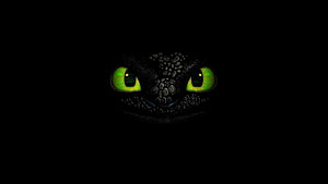 Toothless Dragon Eyes Glowing in Darkness from How to Train Your Dragon HD wallpaper