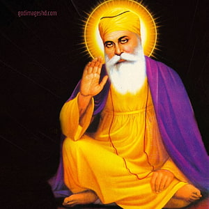 Portrait of Guru Nanak Dev Ji in Yellow Robes with Golden Halo HD phone wallpaper