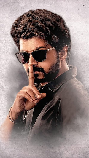 Dhanush in Sunglasses with Shh Gesture HD phone wallpaper
