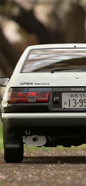 Rear View of a White Toyota AE86 Trueno with Apex Twin Cam 16 Badging and Japanese License Plate HD phone wallpaper