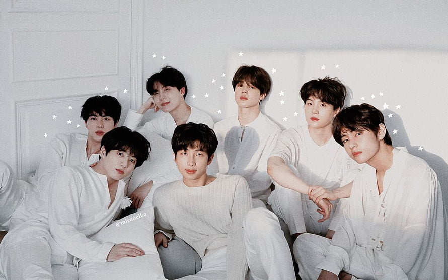 BTS members in all white outfits posing together with starry background HD wallpaper
