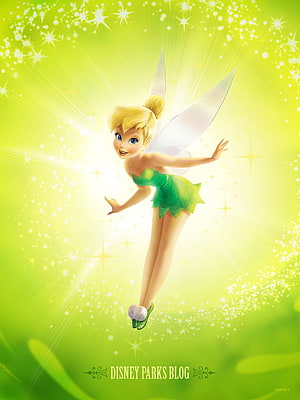 Tinker Bell Flying Through a Glowing Green Sky with Sparkling Fairy Dust HD phone wallpaper