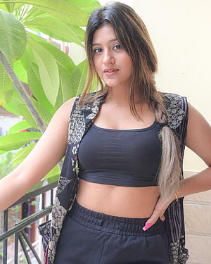 Anjali Arora in Black Crop Top and Patterned Vest on a Balcony HD phone wallpaper
