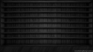 Dark Charcoal Wooden Shelving Unit with Empty Horizontal Compartments and Textured Grain HD wallpaper