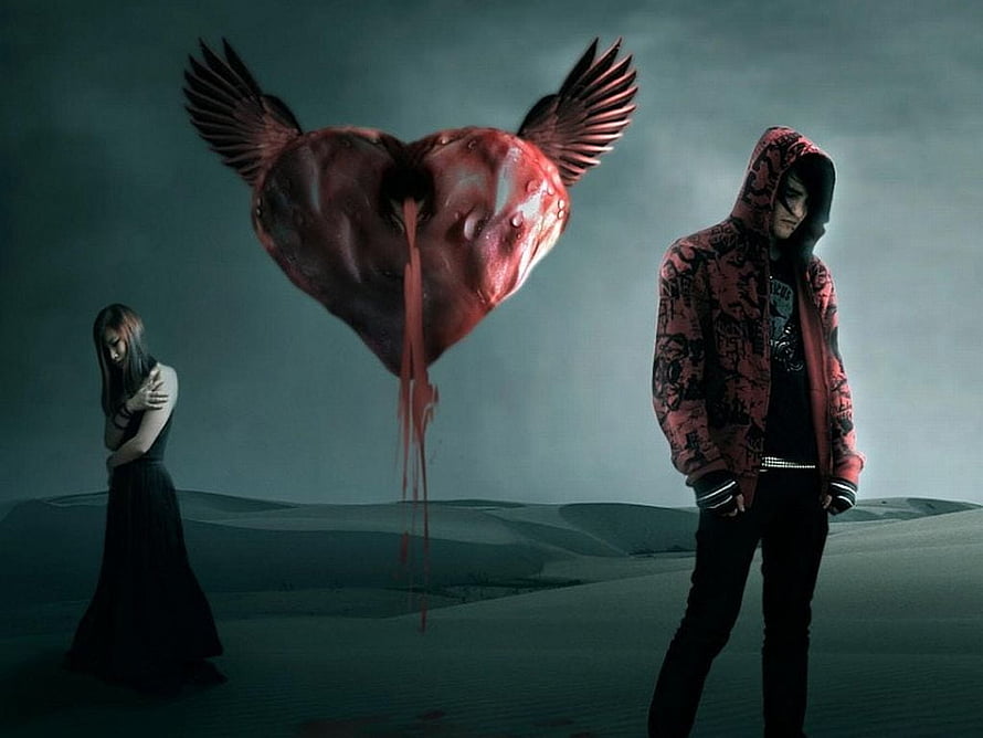 Emotional Breakup Concept with Floating Winged Heart and Two Figures in a Desert Landscape HD wallpaper