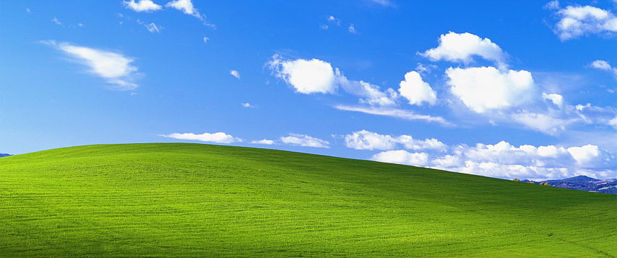 Bliss Wallpaper: Iconic Green Rolling Hill Under Blue Sky with White Clouds HD wallpaper