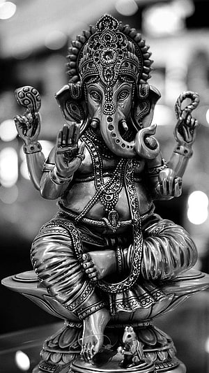 Detailed Black And White Statue Of Lord Ganesha Sitting On Lotus HD phone wallpaper