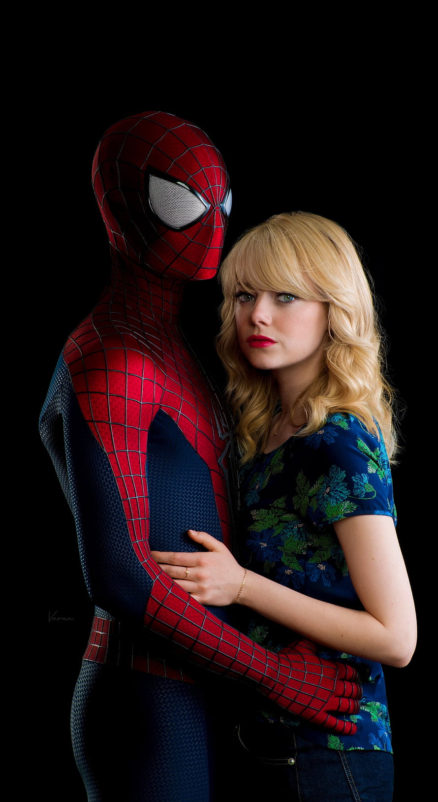 Spider-Man and Gwen Stacy embracing in a dramatic portrait against a black background, The amazing spiderman, Emma stone, tie, Peter Parker, Andrew Garfield HD phone wallpaper