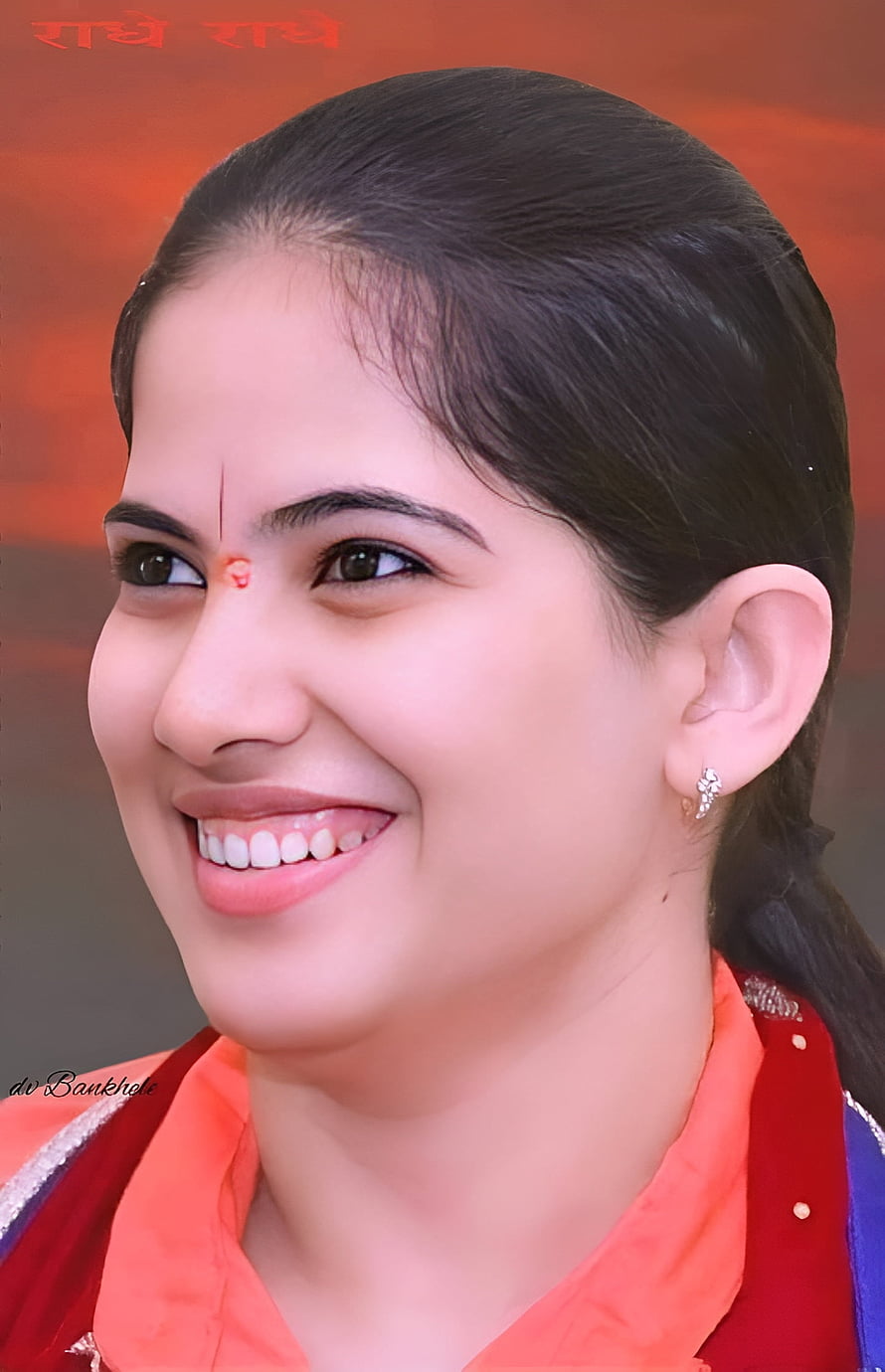 Jaya Kishori smiling portrait with bindi and traditional Indian attire HD phone wallpaper