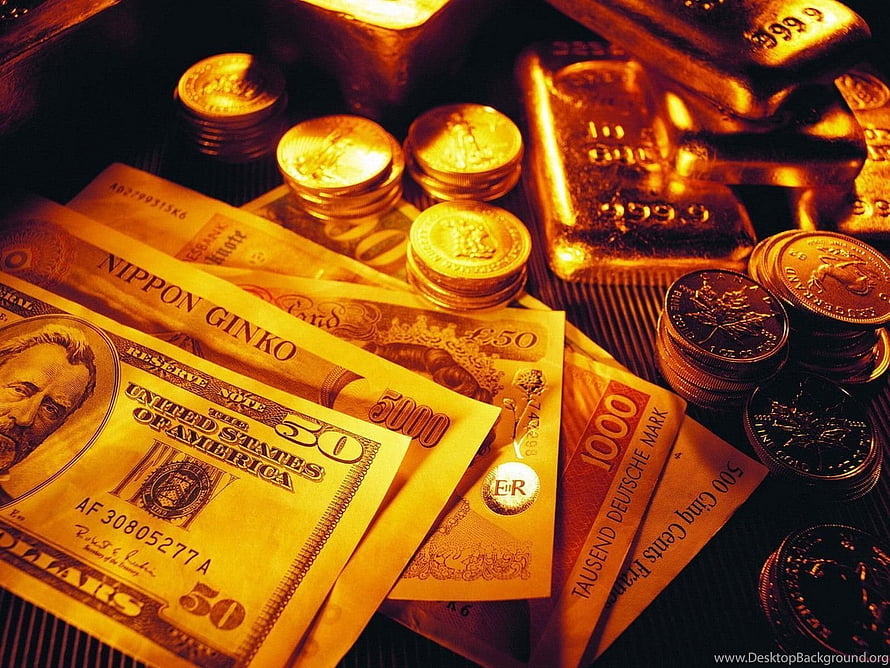 Stacks of international banknotes and gold coins arranged with shiny gold bars HD wallpaper