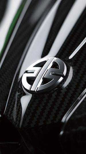 Kawasaki H2R Carbon Fiber Emblem Close-Up with Green Accent Detail HD phone wallpaper