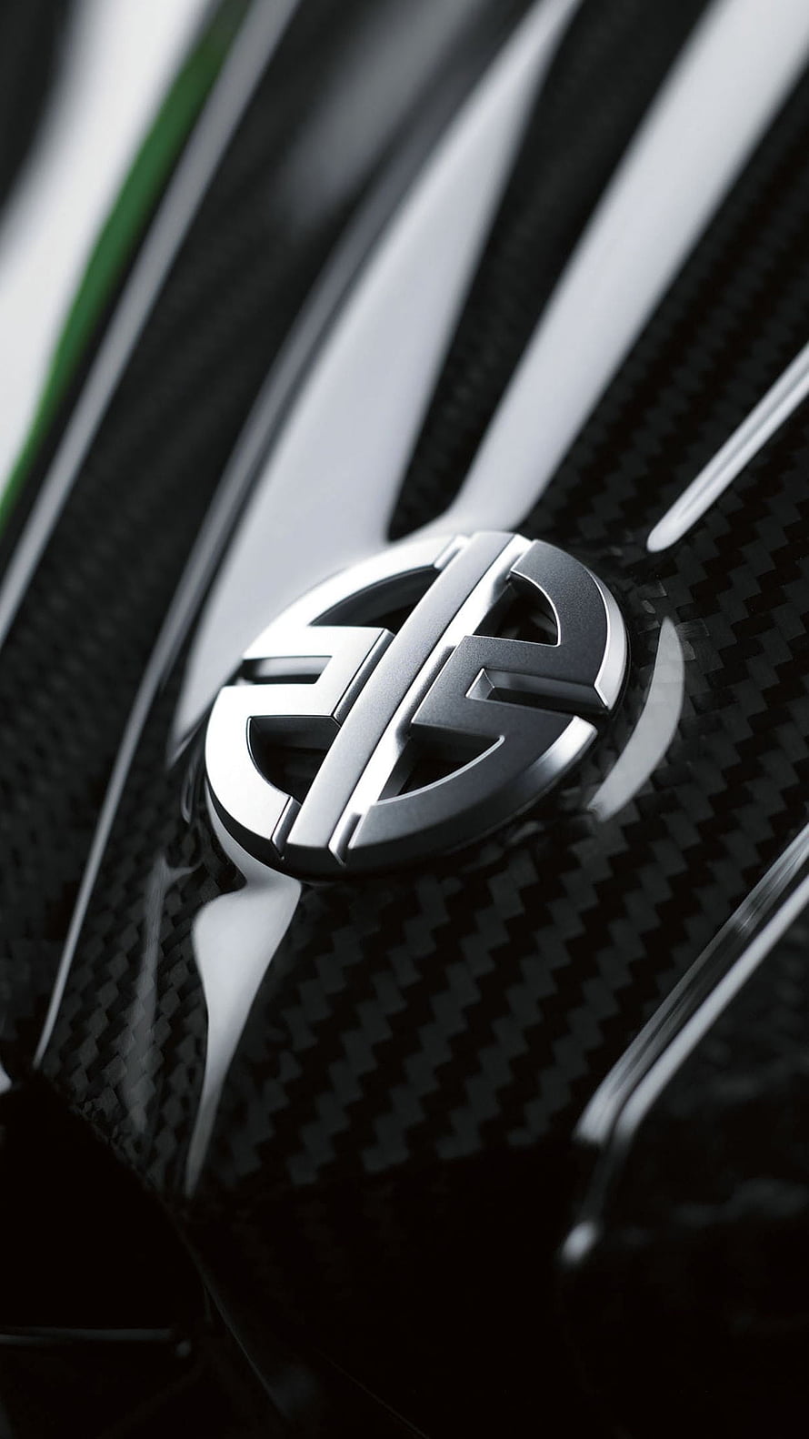 Kawasaki H2R Carbon Fiber Emblem Close-Up with Green Accent Detail HD phone wallpaper