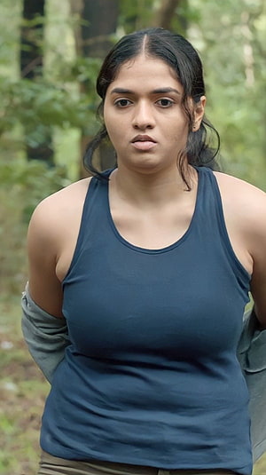 Sunaina Tamil Actress in Navy Tank Top with Forest Background HD phone wallpaper