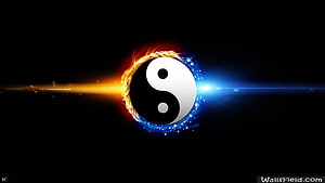 Glowing Yin Yang Symbol with Fire and Ice Energy on Black Background HD wallpaper