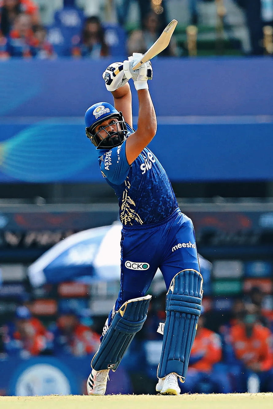 Ruturaj Gaikwad playing a shot for Mumbai Indians in IPL cricket match HD phone wallpaper