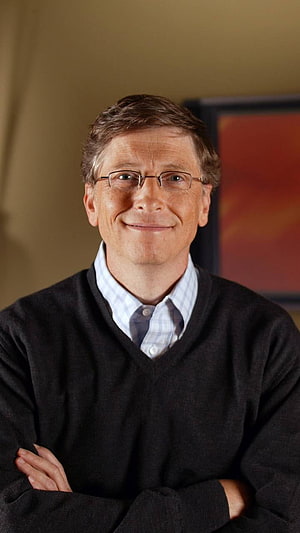 Bill Gates Professional Portrait in Dark V-Neck Sweater and Glasses HD phone wallpaper