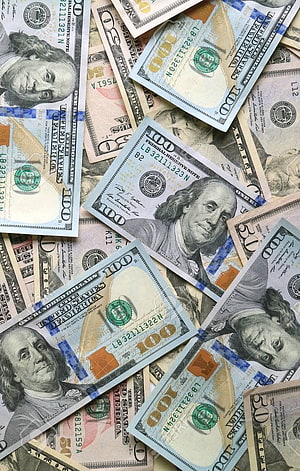 Scattered US One Hundred Dollar Bills Featuring Benjamin Franklin Portrait HD phone wallpaper