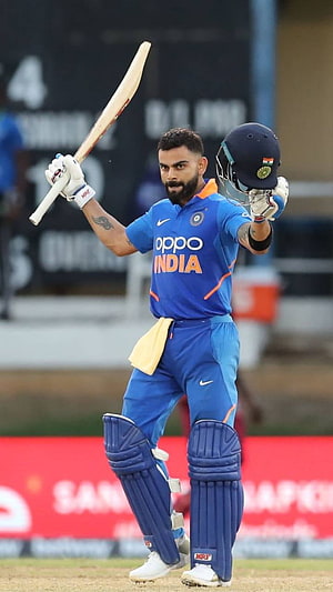 Virat Kohli Celebrating a Century in Blue India Cricket Jersey HD phone wallpaper
