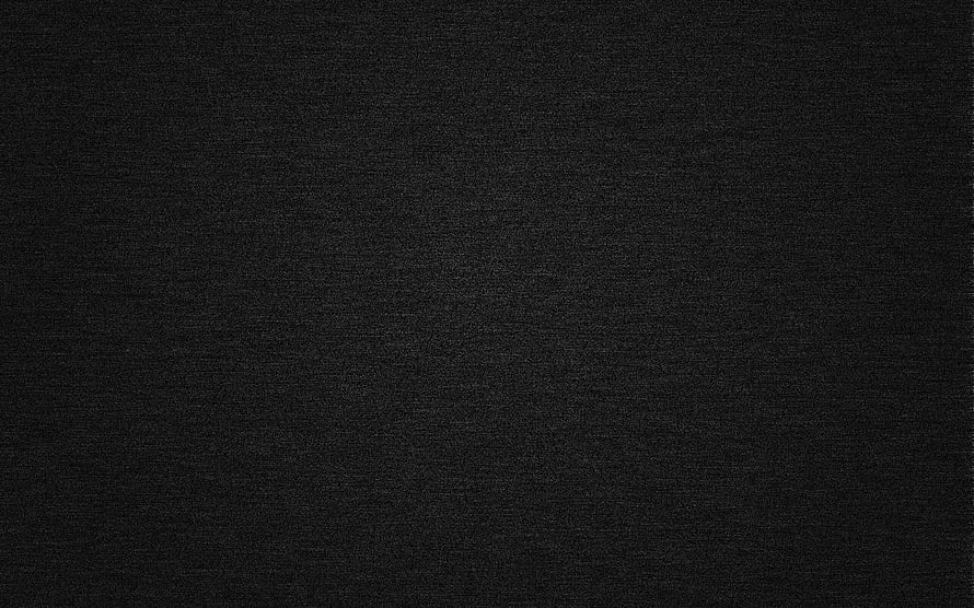 Dark Textured Surface with Subtle Grain and Faint Linear Streaks HD wallpaper