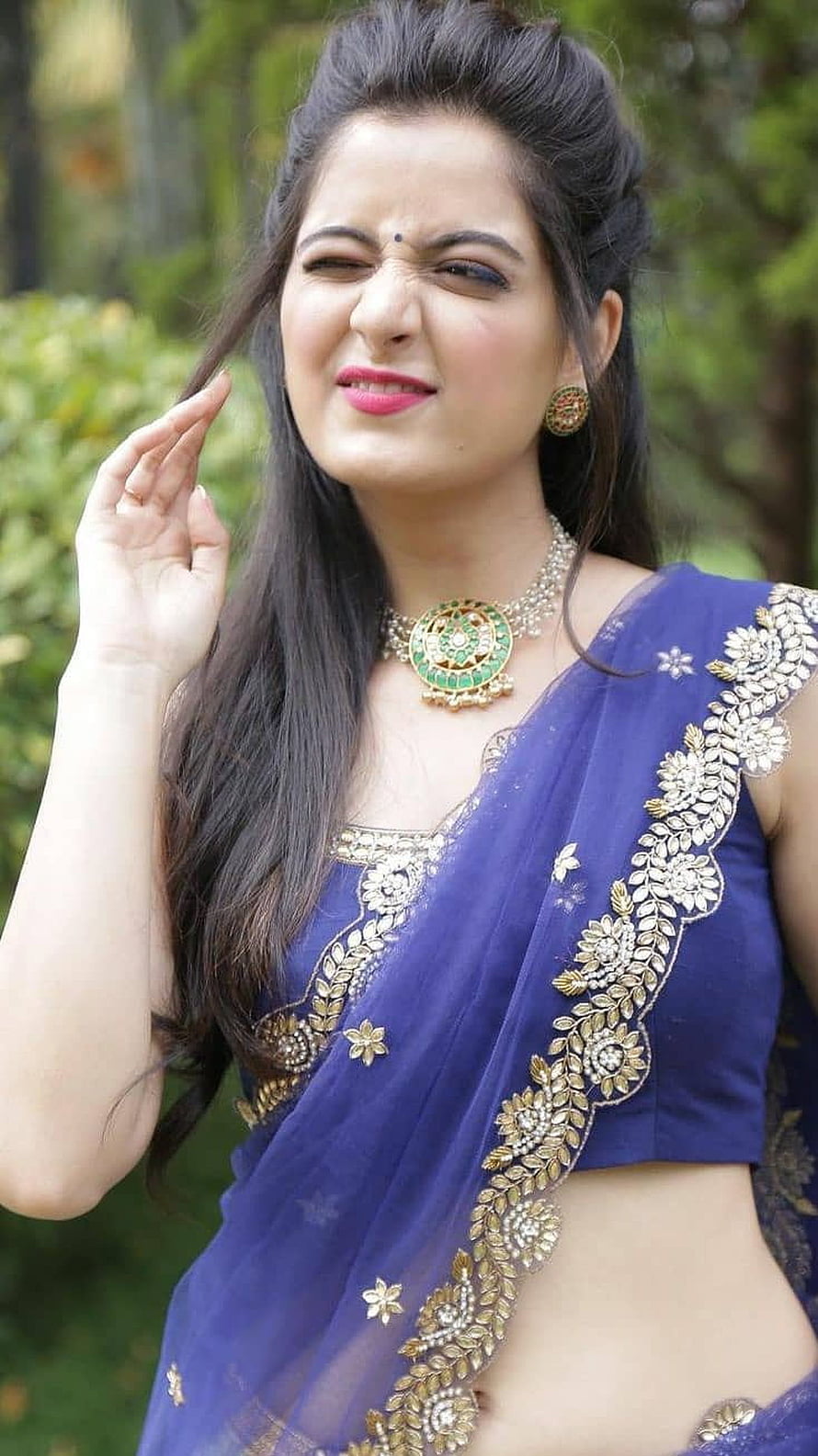 Ashika Ranganath in a blue embroidered saree with traditional jewelry HD phone wallpaper