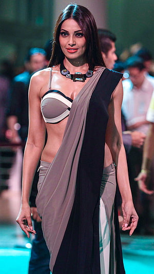 Bipasha Basu in a modern draped ensemble on the fashion runway HD phone wallpaper