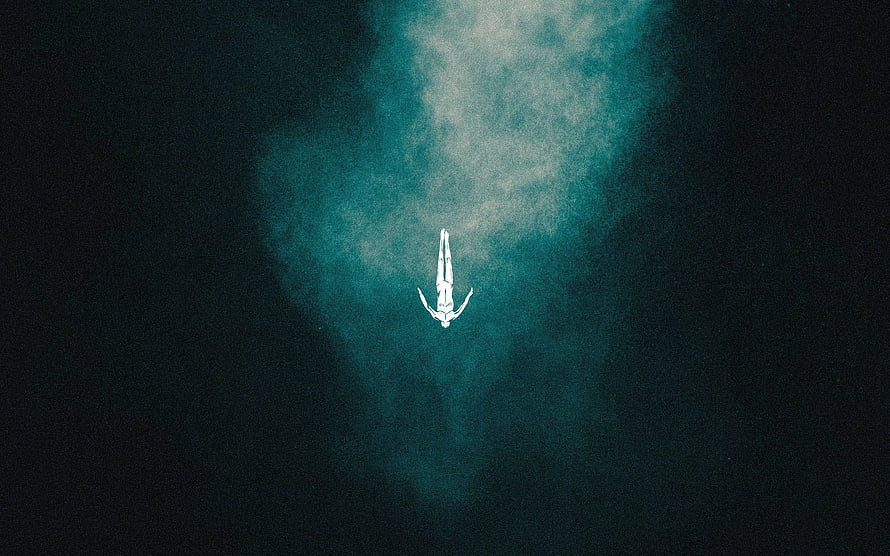 Ethereal figure floating in deep teal underwater darkness with soft light beam HD wallpaper