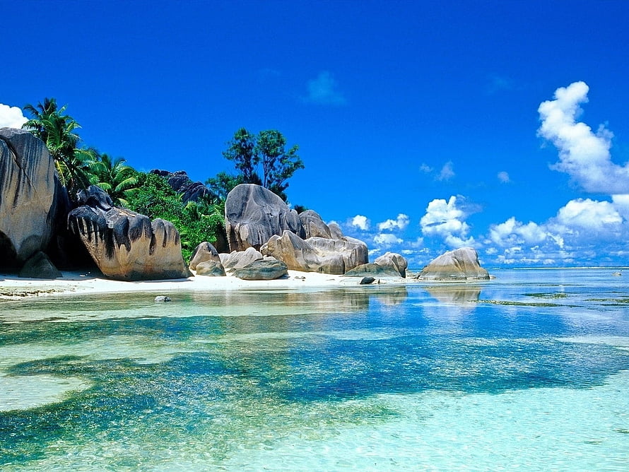 Tropical Beach with Giant Granite Boulders and Crystal Clear Turquoise Water HD wallpaper