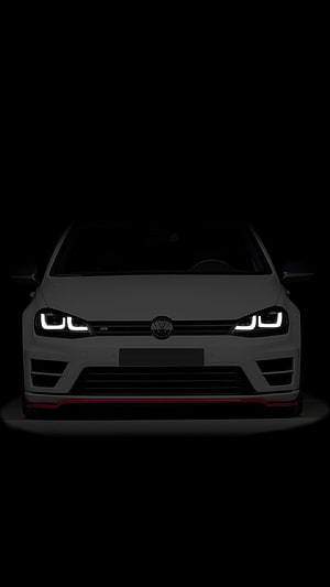 Volkswagen Golf R Front View with LED Headlights in Dark Studio Setting HD phone wallpaper