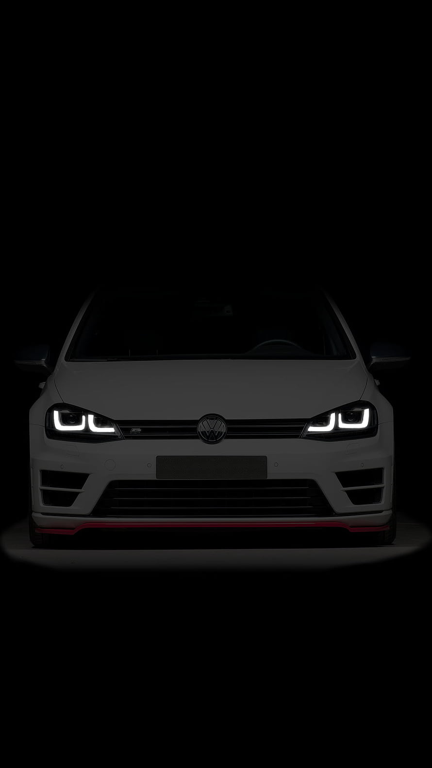 Volkswagen Golf R Front View with LED Headlights in Dark Studio Setting HD phone wallpaper