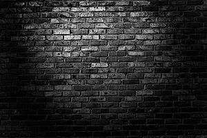 Dark Vintage Brick Wall Texture With Dramatic Spotlight Effect HD wallpaper