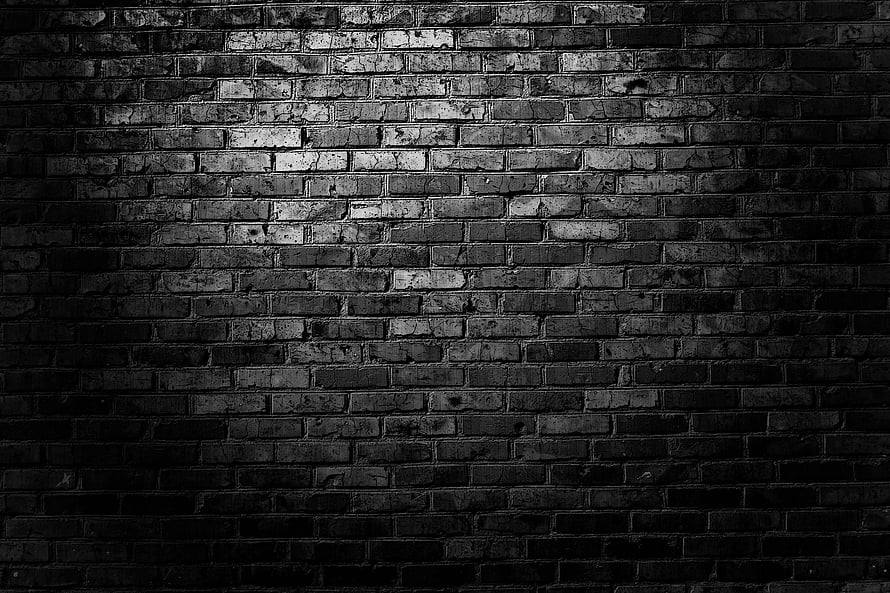 Dark Vintage Brick Wall Texture With Dramatic Spotlight Effect HD wallpaper