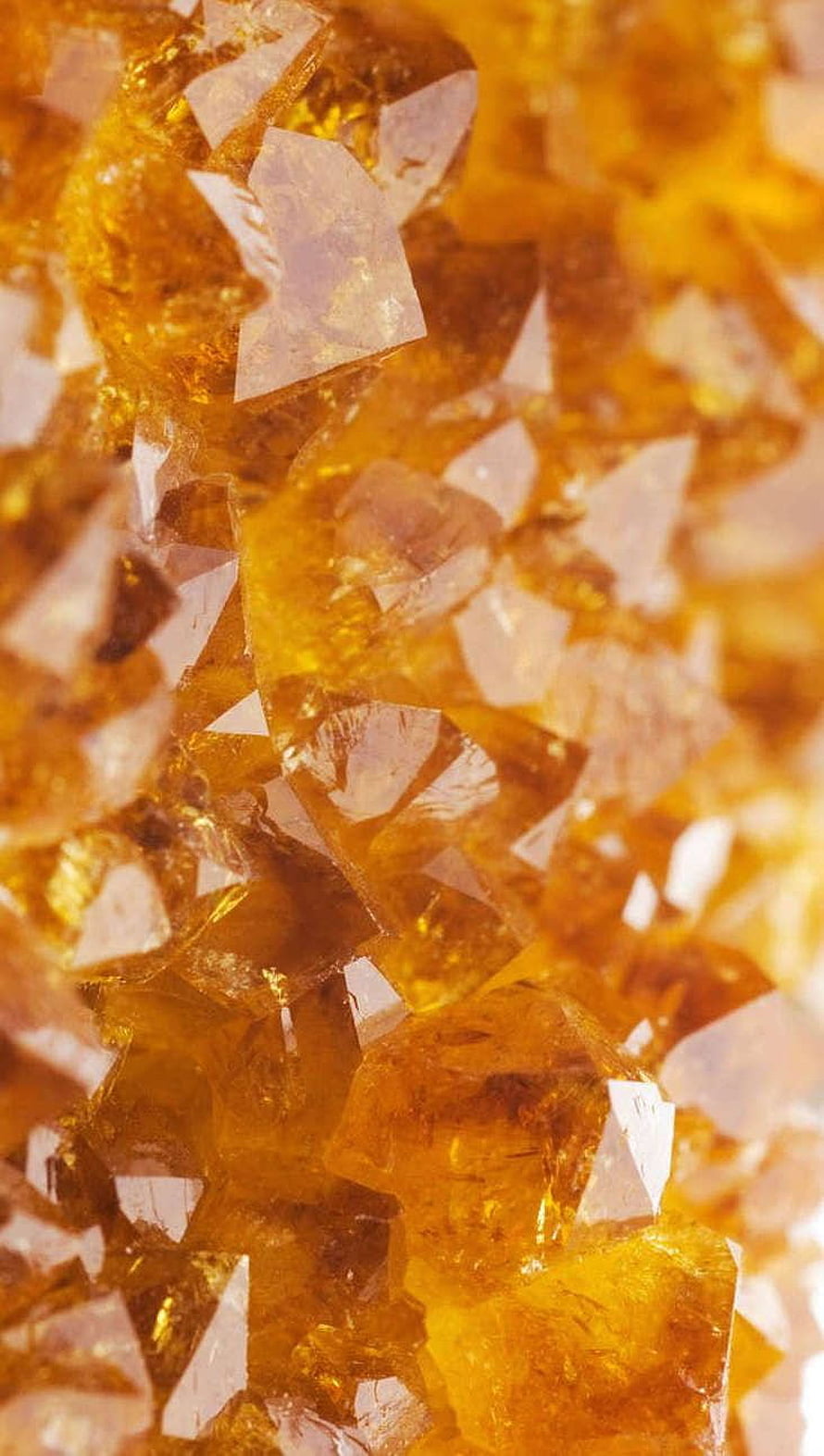 Close-Up of Golden Citrine Crystal Cluster with Sharp Geometric Facets and Amber Hues HD phone wallpaper