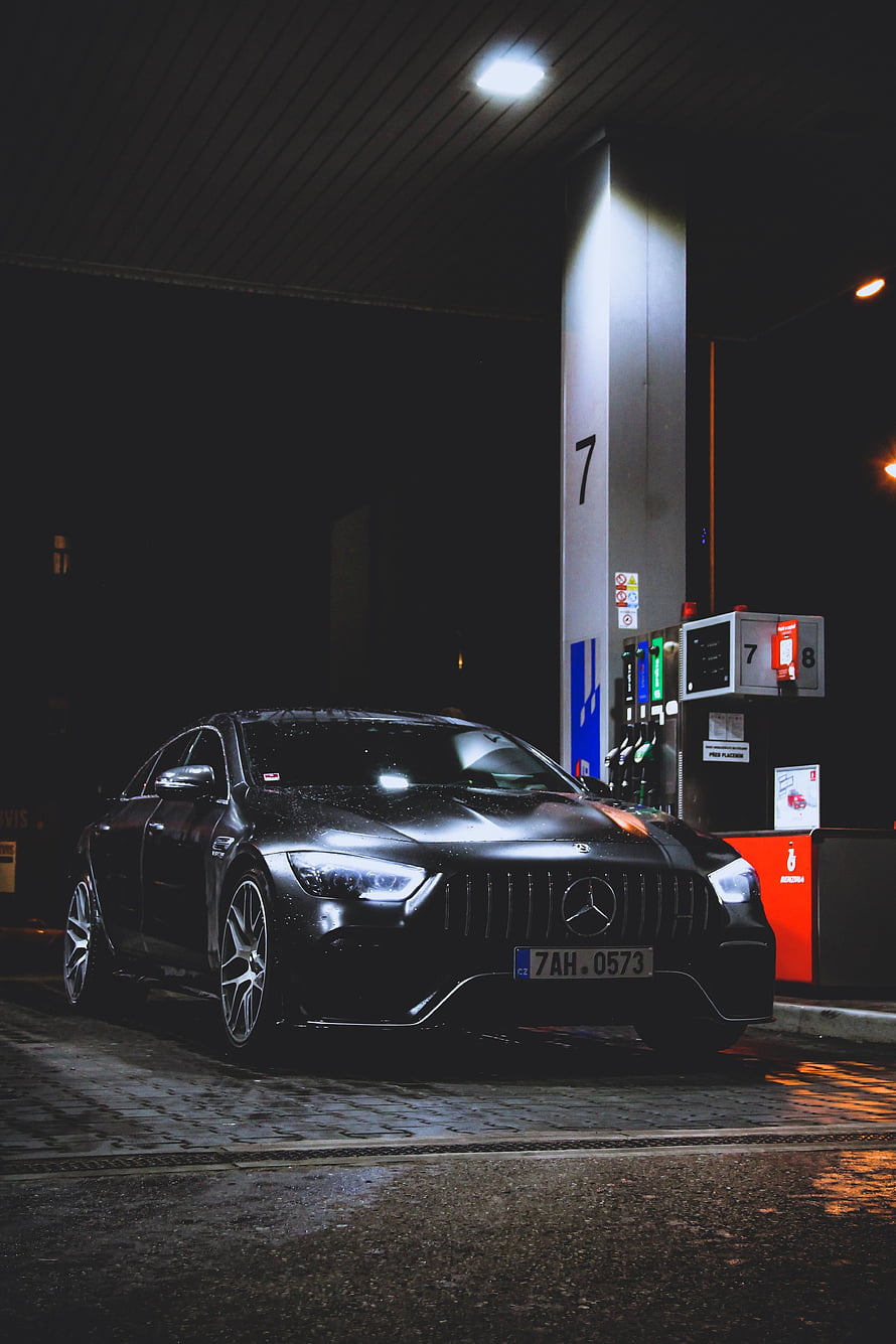 Matte Black Mercedes-AMG GT 63 S at Gas Station at Night HD phone wallpaper