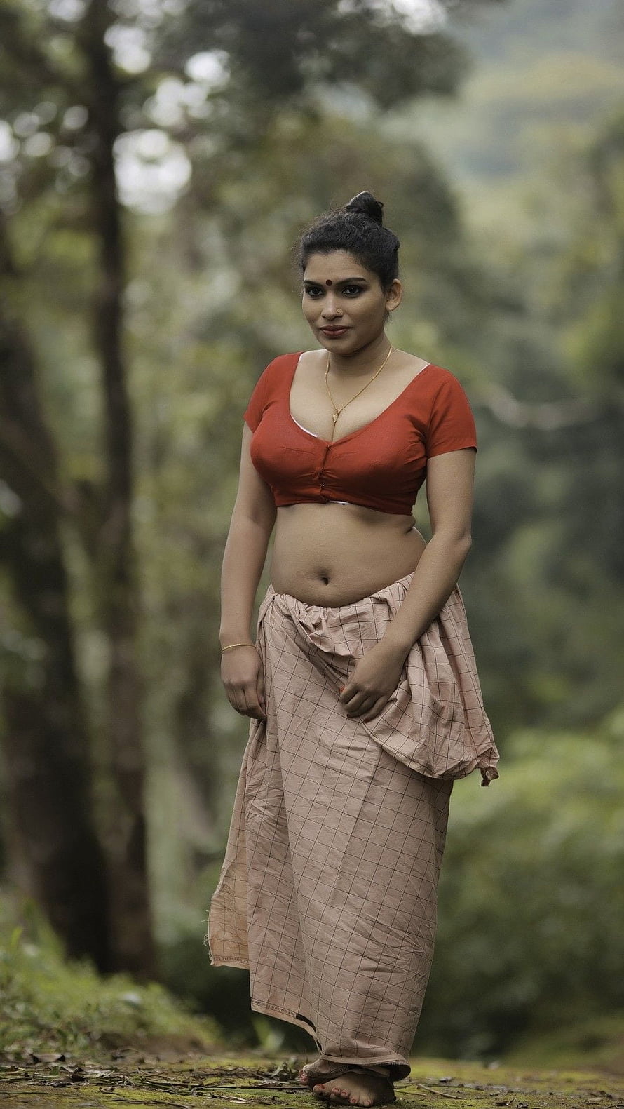 Woman in Traditional Indian Attire Standing in a Lush Forest, Reshmi nair, model HD phone wallpaper