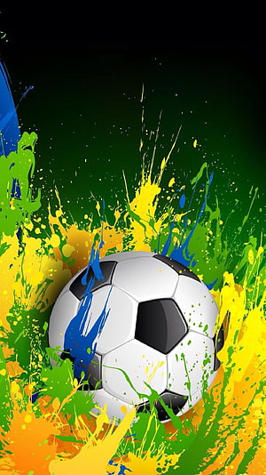 Vibrant Soccer Ball with Dynamic Paint Splashes on Dark Green Background HD phone wallpaper