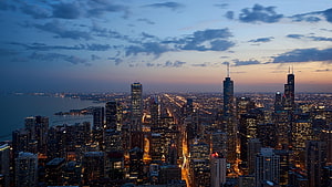 Chicago Skyline at Dusk with Lake Michigan and City Lights HD wallpaper