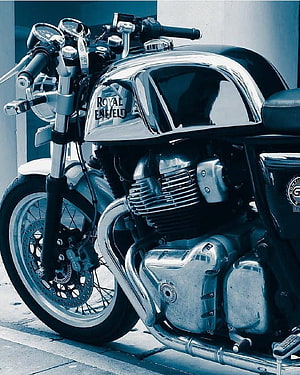 Royal Enfield Classic Motorcycle with Chrome Details and Blue Tint HD phone wallpaper
