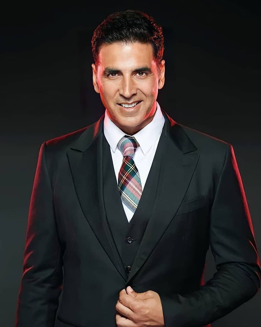 Akshay Kumar in a Formal Black Three-Piece Suit with Plaid Tie HD phone wallpaper