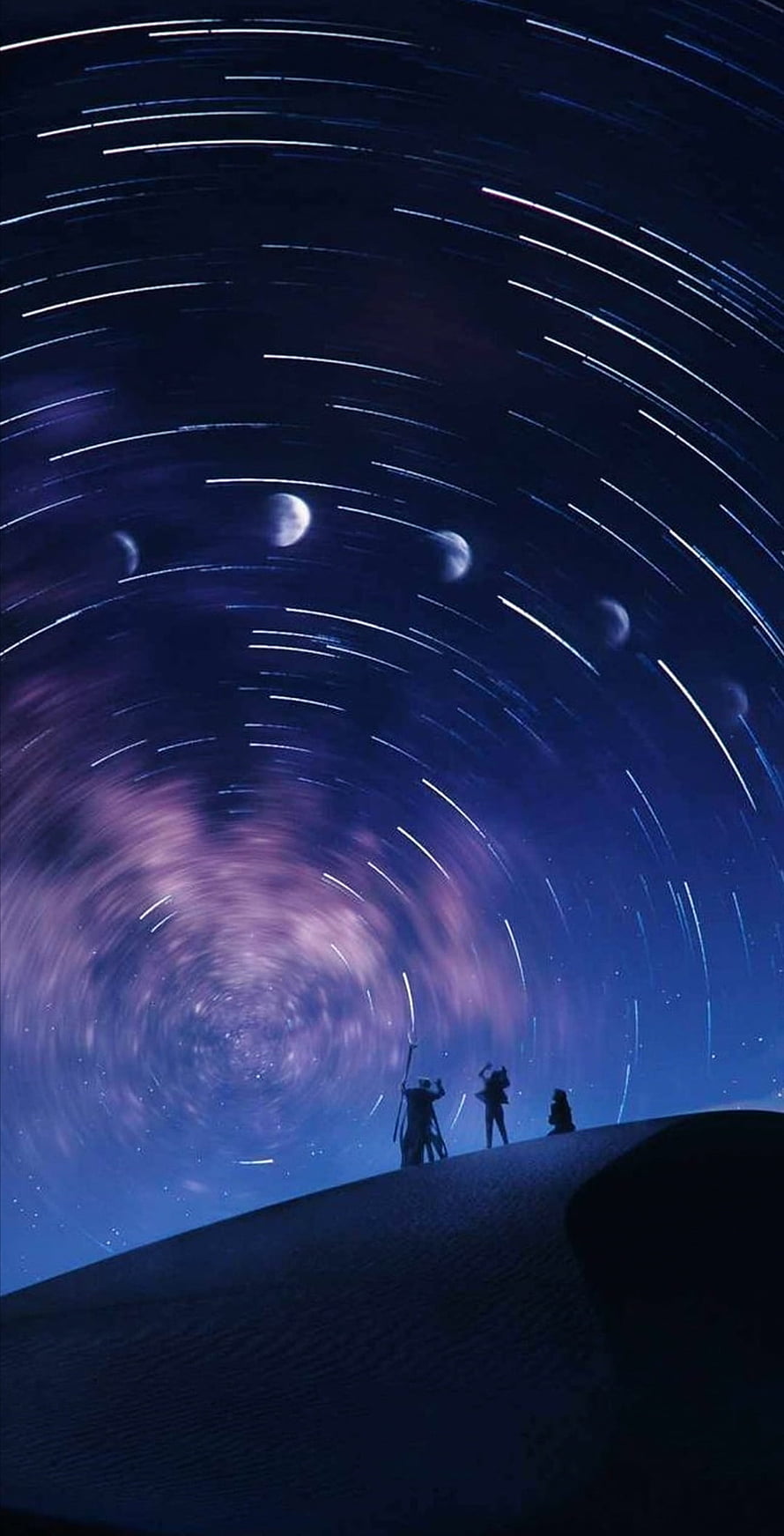 Silhouettes of adventurers gazing at a swirling starry night sky with celestial bodies and star trails HD phone wallpaper