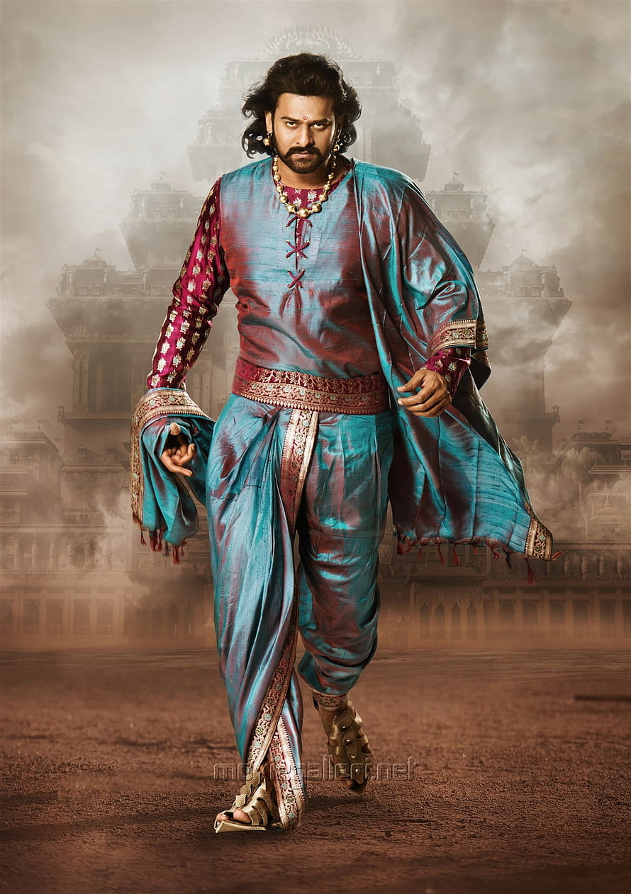 Prabhas as Baahubali in Turquoise Silk Attire Before Ancient Temple HD phone wallpaper
