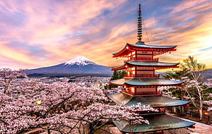 Chureito Pagoda and Mount Fuji at Sunset with Cherry Blossoms in Japan HD wallpaper