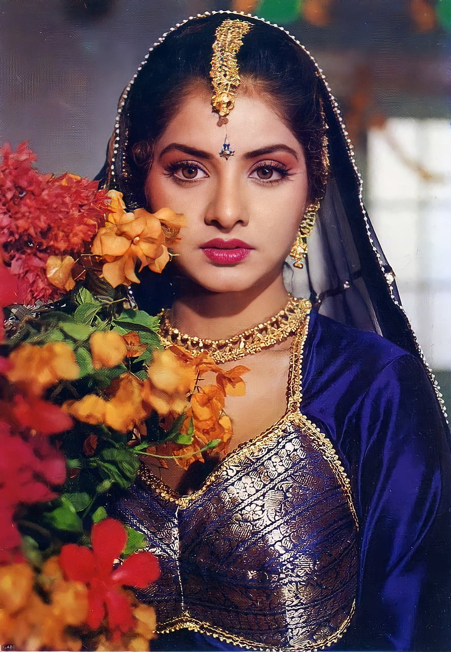 Divya Bharti in Traditional Indian Bridal Attire with Gold Jewelry and Floral Bouquet HD phone wallpaper